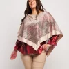 Poncho in pizzo con raso