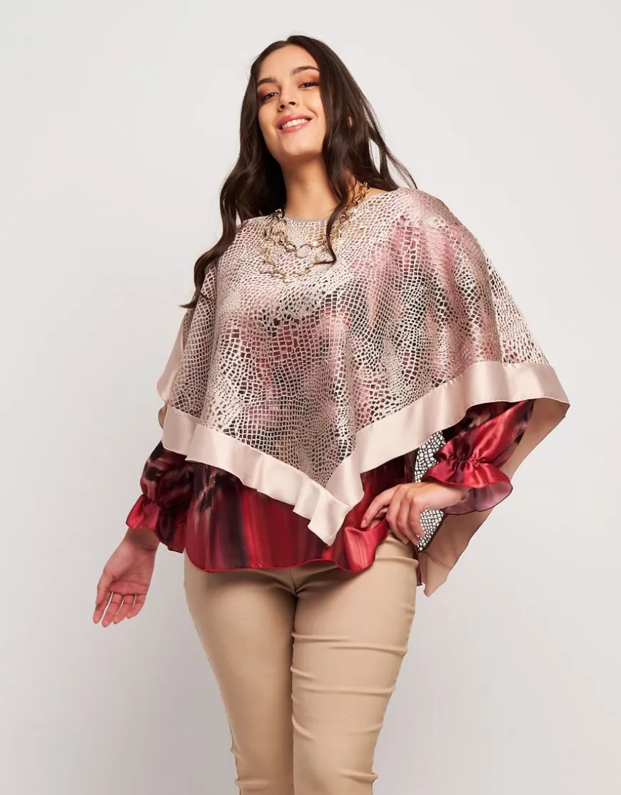 Poncho in pizzo con raso