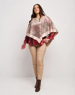 Poncho in pizzo con raso