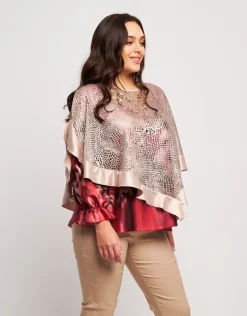 Poncho in pizzo con raso