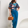 Poncho in raso con elastico e paillettes