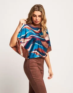 Poncho in raso con elastico e paillettes