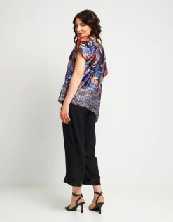 Poncho in raso con spallina in paillettes