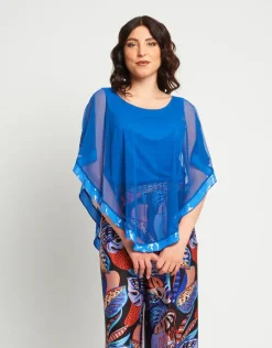 Poncho in rete con bordi in paillettes