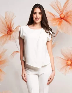 Top asimmetrico con pieghe