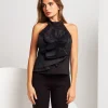 Top con fiore in taffetà e spacco