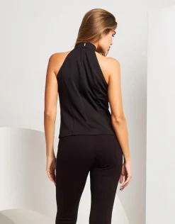 Top con fiore in taffetà e spacco