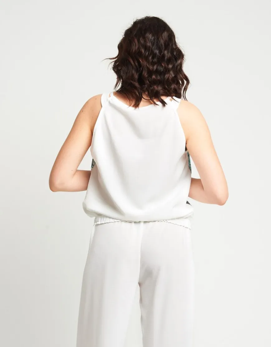 Top con paillettes fantasia floreale