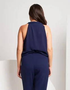 Top con sciarpina e paillettes