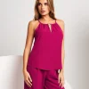 Top con scollo e accessorio