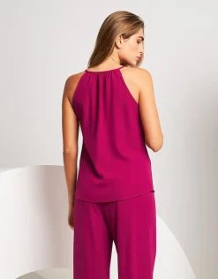 Top con scollo e accessorio