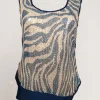 Top con volant e fronte di paillettes