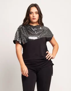 T-shirt asimmetrica con paillettes e coulisse