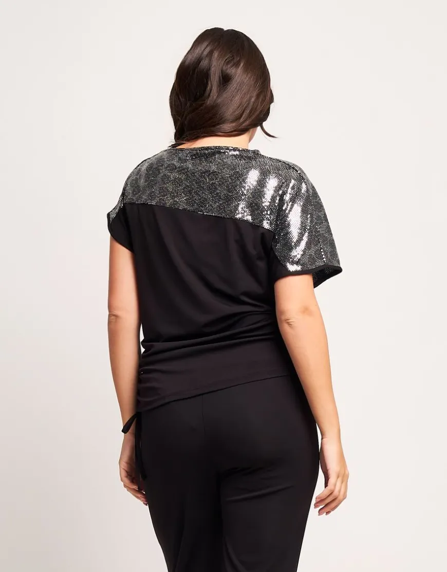 T-shirt asimmetrica con paillettes e coulisse