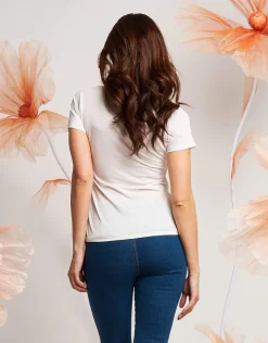 T-shirt con rosa di paillettes