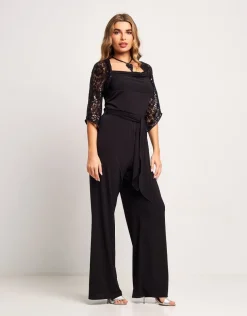 Tuta con pizzo e paillettes