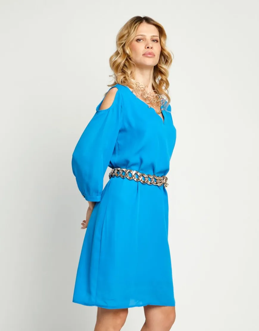 Vestito con oblò e catena oro