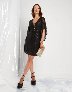 Vestito in paillettes con maniche ad ala