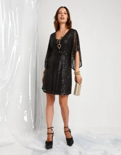 Vestito in paillettes con maniche ad ala