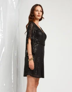 Vestito in paillettes con maniche ad ala