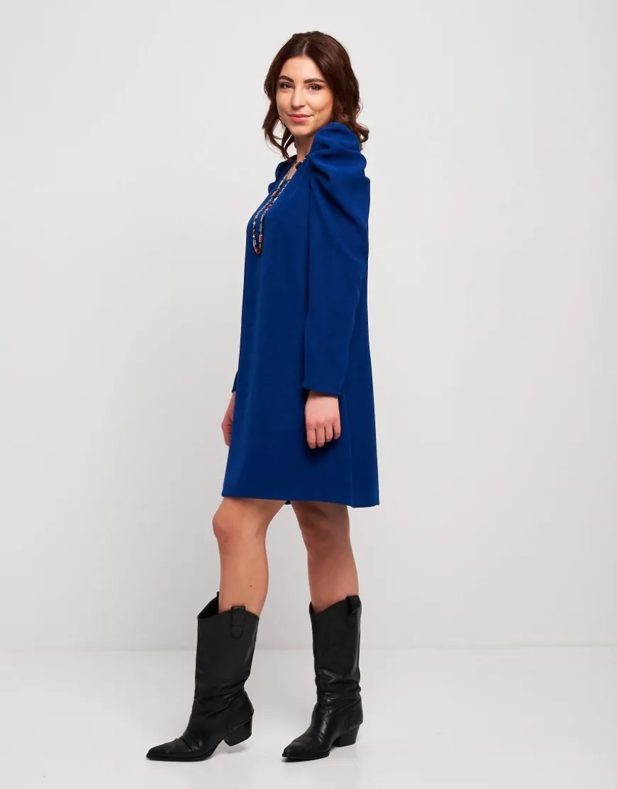 Vestito in velluto con drappeggi