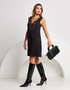 Vestito svasato con oblò e accessorio