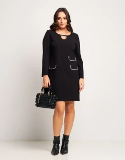 Vestito svasato con pattine bordate