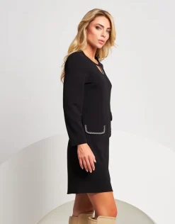 Vestito svasato con pattine bordate
