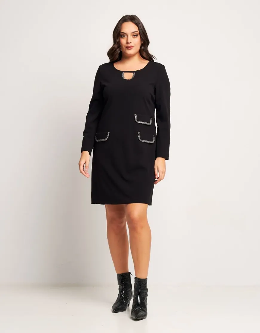 Vestito svasato con pattine bordate