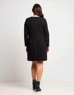 Vestito svasato con pattine bordate