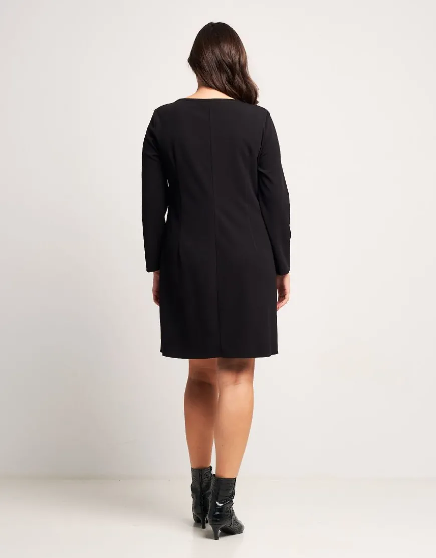 Vestito svasato con pattine bordate